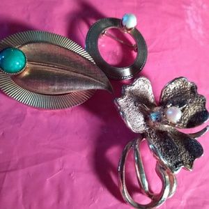 Three gold tone vintage brooches. No hallmarks.